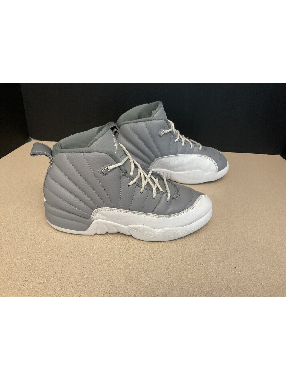 Youth’s Nike Air Jordan 12 Retro Stealth Grey/White Athletic Shoes. Size 3Y.